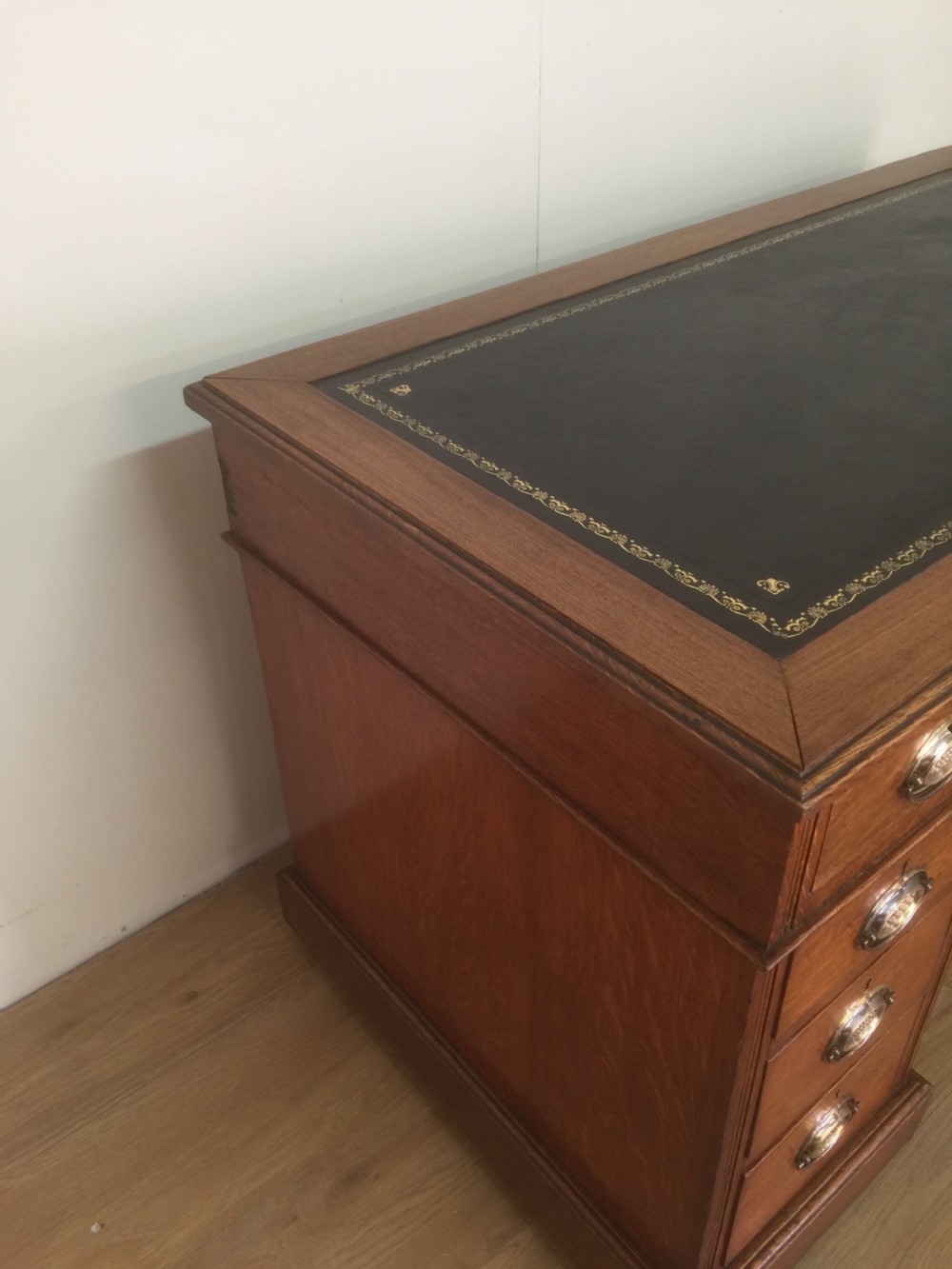 Edwardian golden oak twin Pedestal desk with tooled leather top View X