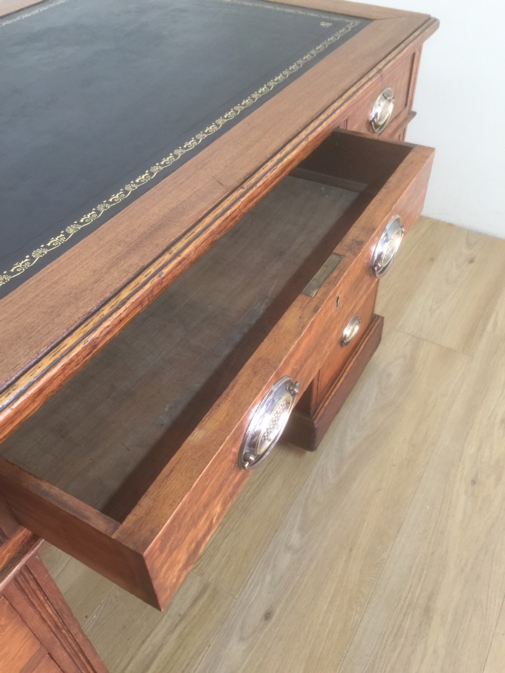 Edwardian golden oak twin Pedestal desk with tooled leather top View XIII
