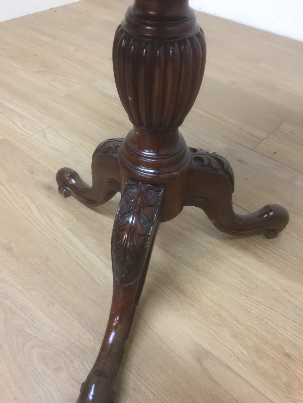 Nineteenth century circular Mahogany wine table on a carved base View II