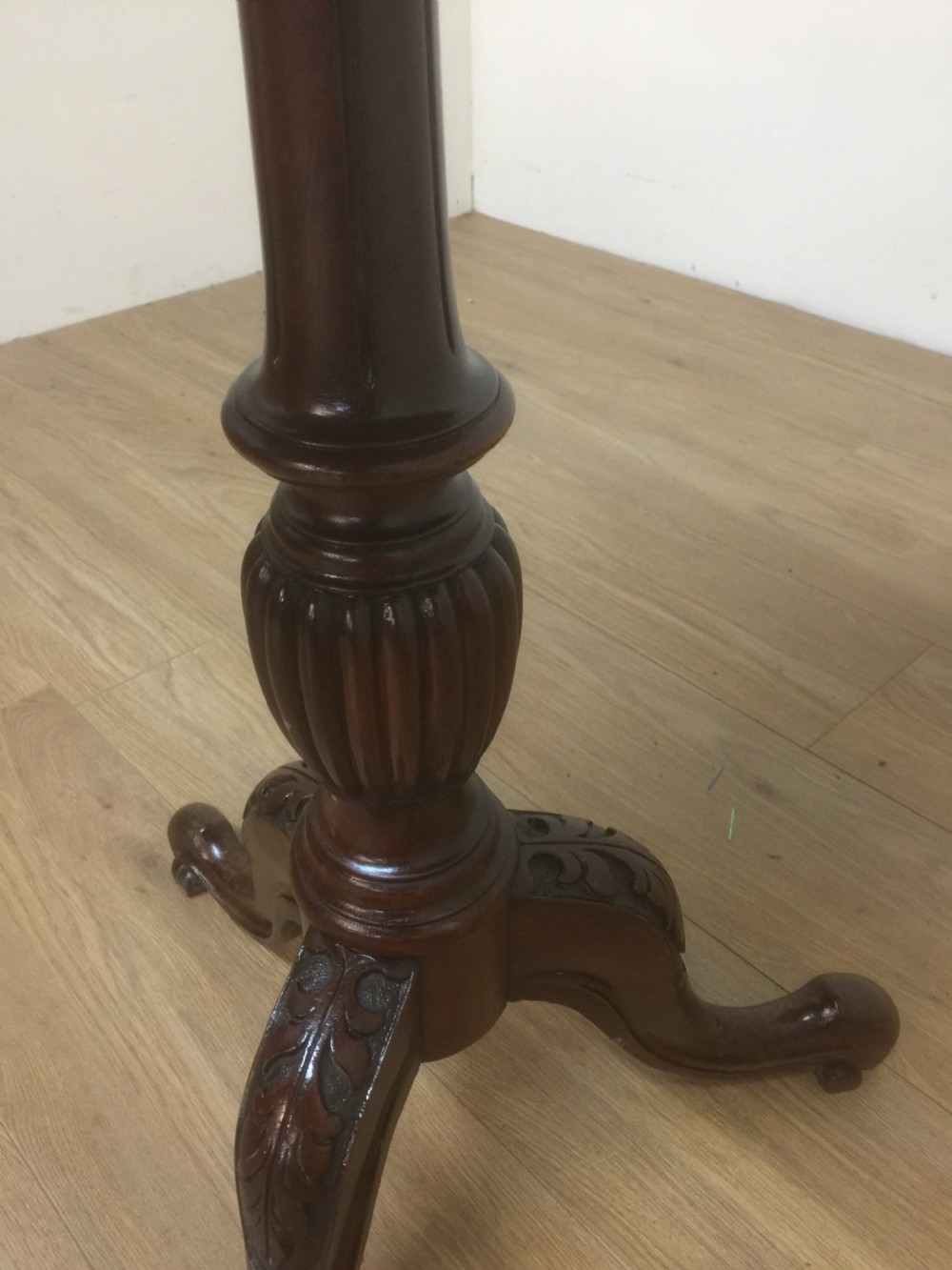 Nineteenth century circular Mahogany wine table on a carved base View III