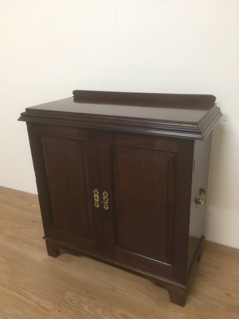 Small nineteenth century mahogany campaign  folio cupboard