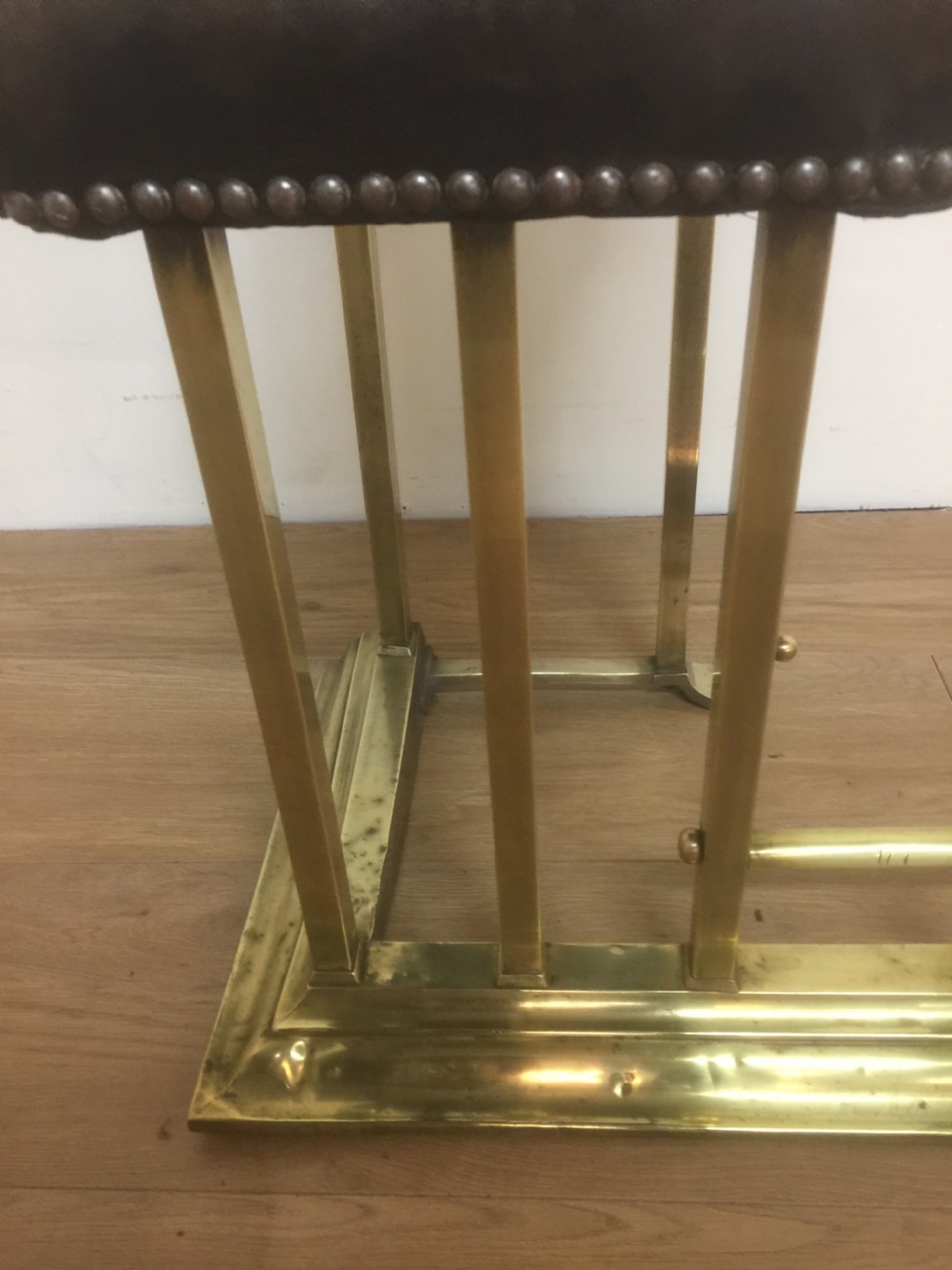 Victorian leather and brass club fender View VI