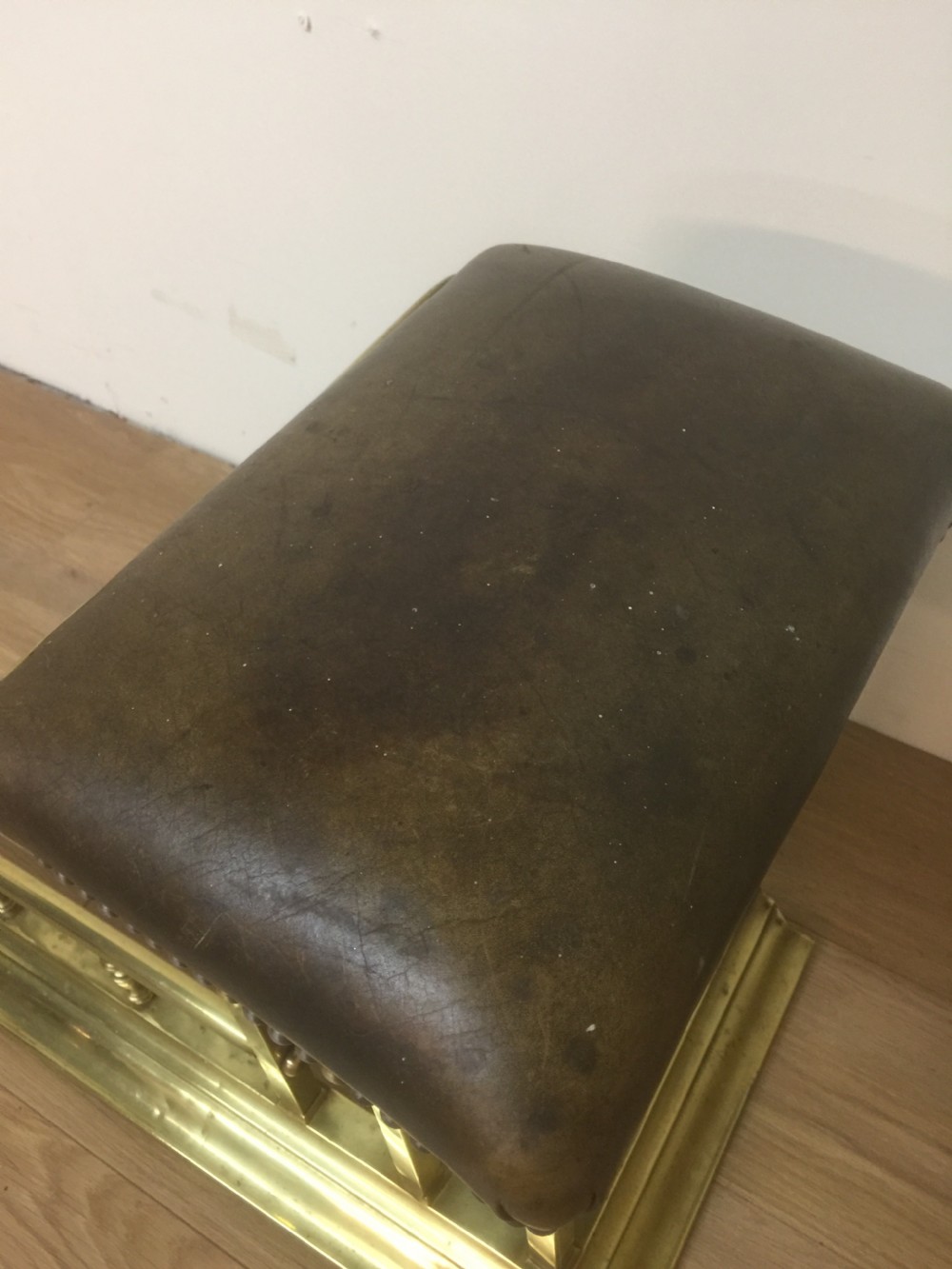 Victorian leather and brass club fender View VIII