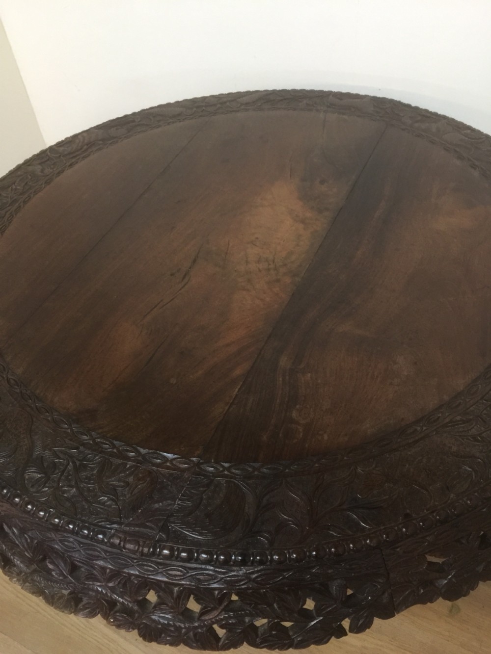 Nineteenth century carved oriental tilt top centre table  View II