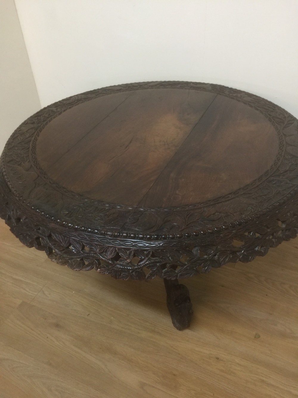 Nineteenth century carved oriental tilt top centre table  View III