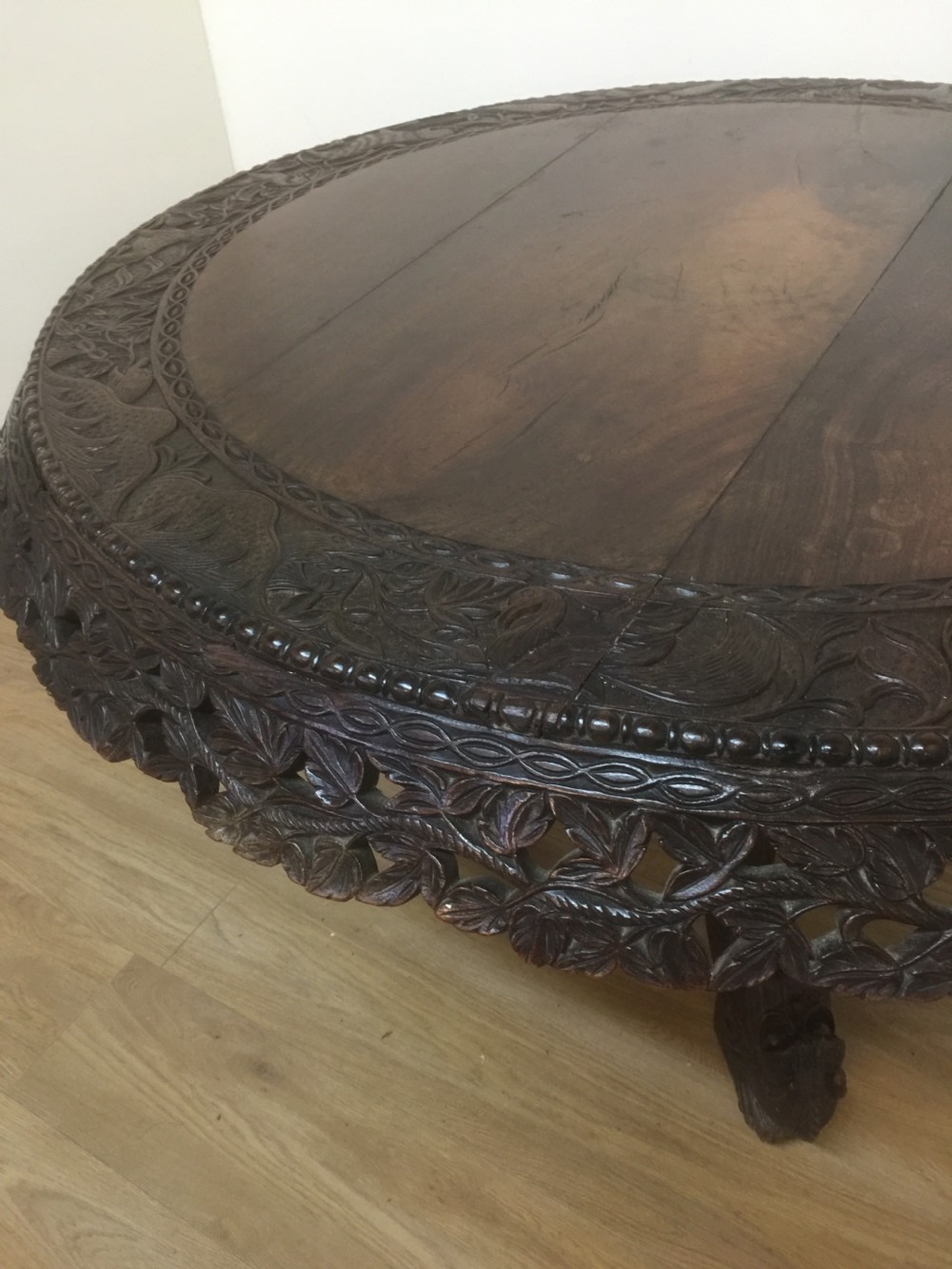 Nineteenth century carved oriental tilt top centre table  View V