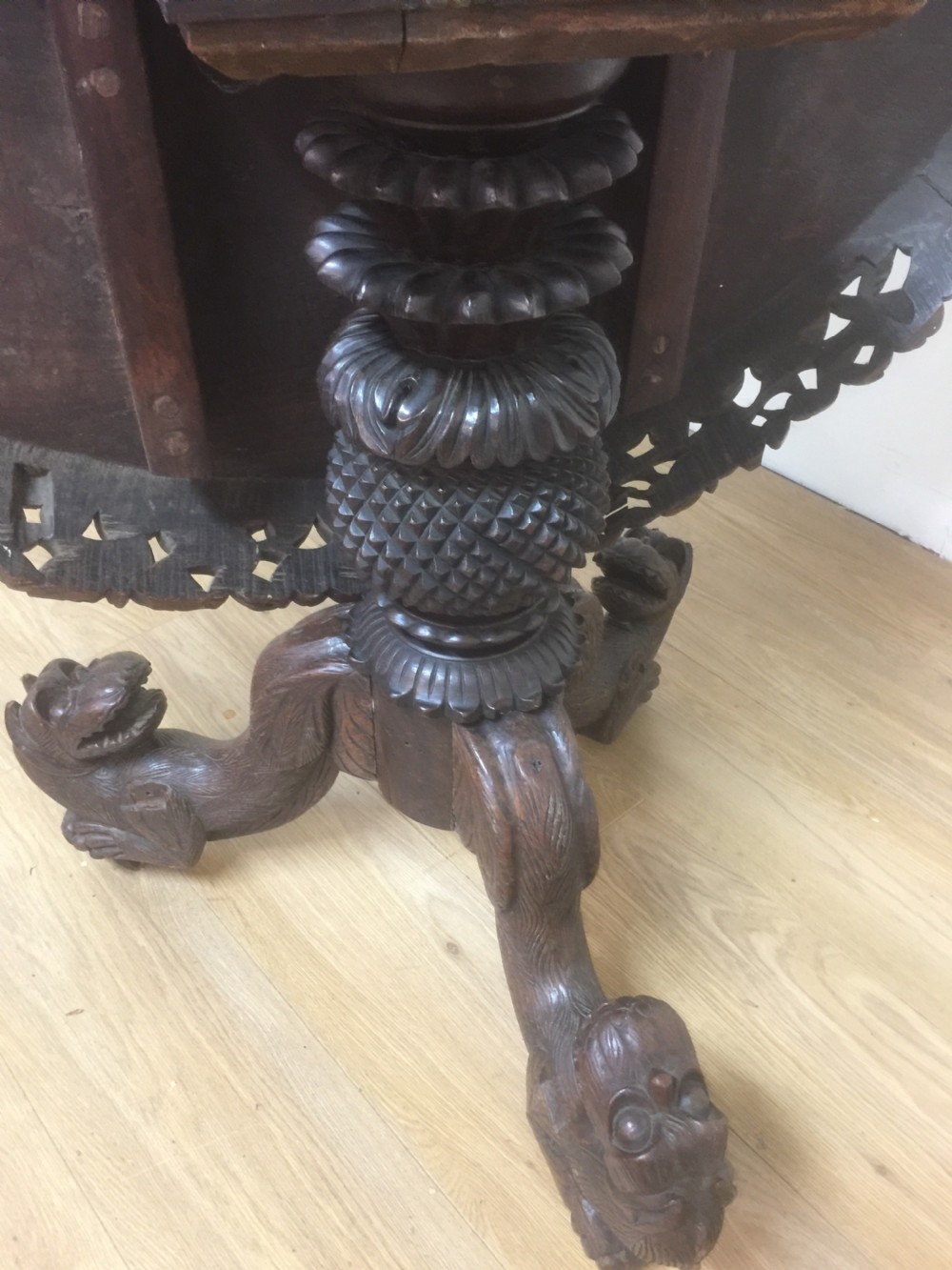 Nineteenth century carved oriental tilt top centre table  View XII