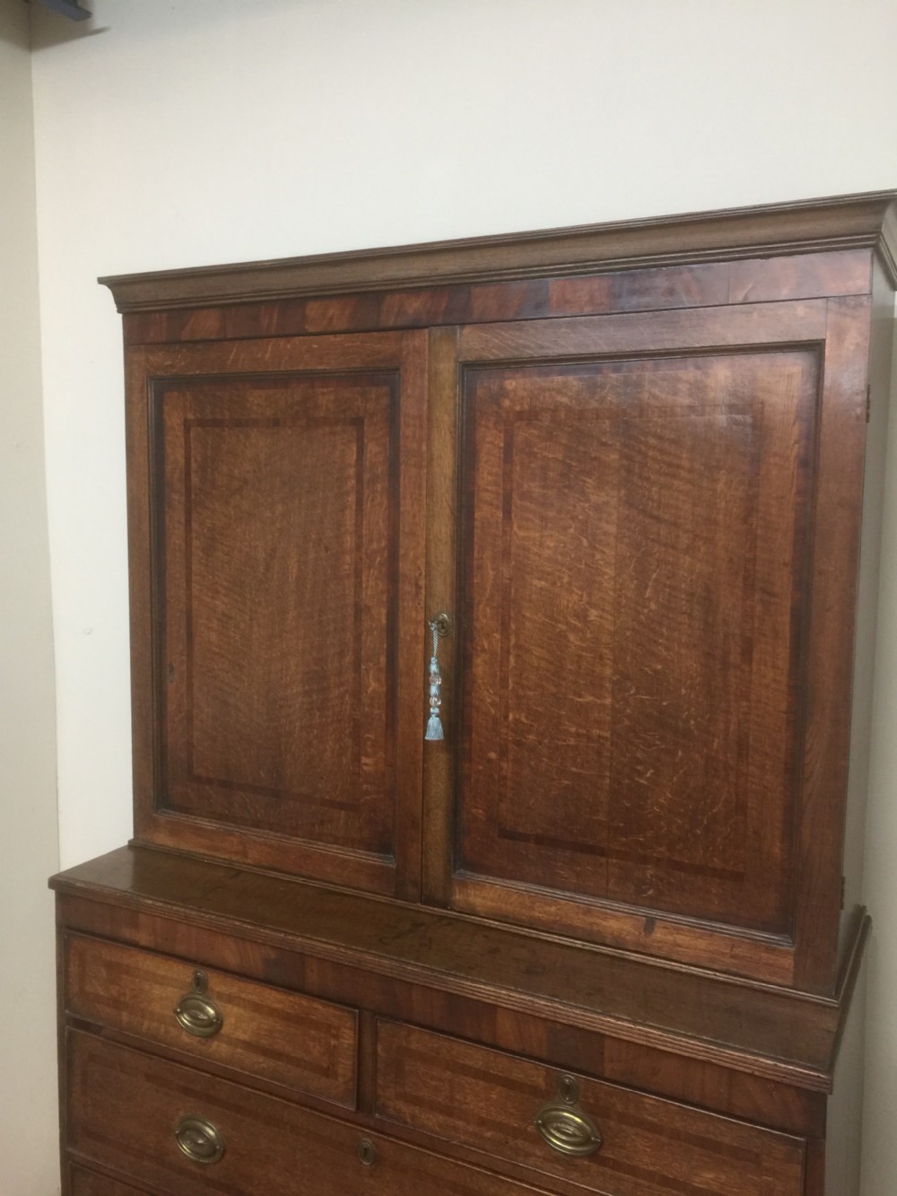 Georgian Oak housekeepers Cupboard crossbanded in Mahogany  View II