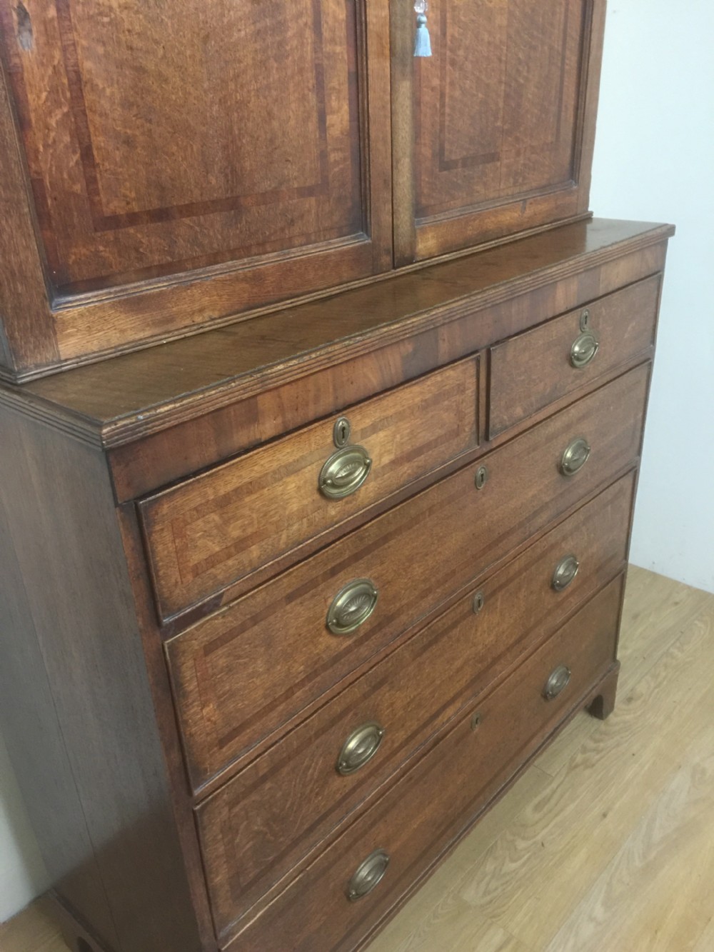 Georgian Oak housekeepers Cupboard crossbanded in Mahogany  View X