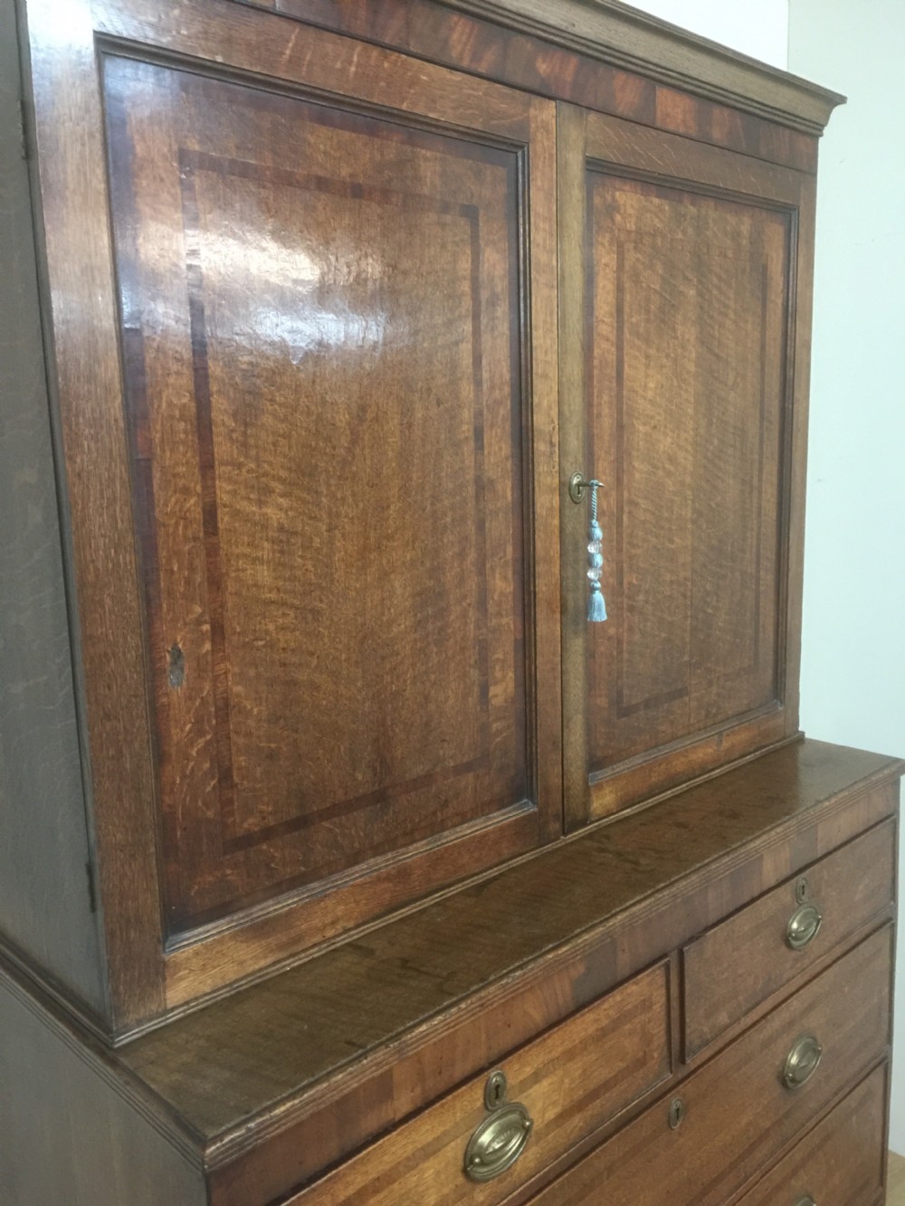 Georgian Oak housekeepers Cupboard crossbanded in Mahogany  View XII