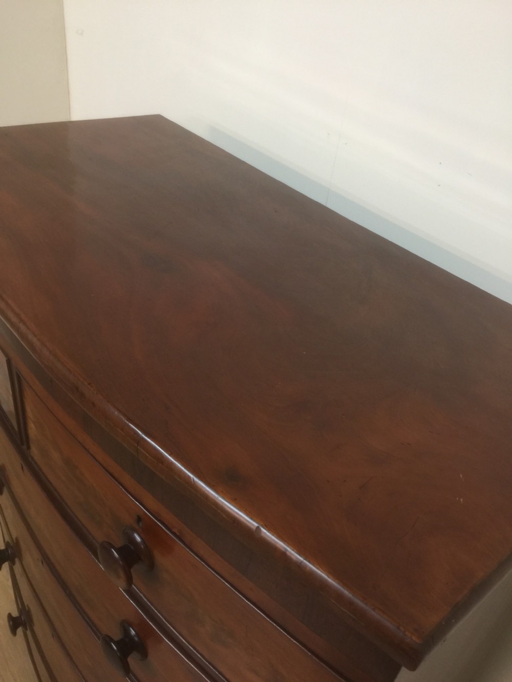 Nineteenth century flame mahogany five height bow fronted chest of drawers  View III