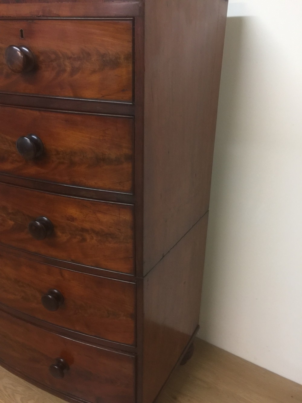 Nineteenth century flame mahogany five height bow fronted chest of drawers  View IV
