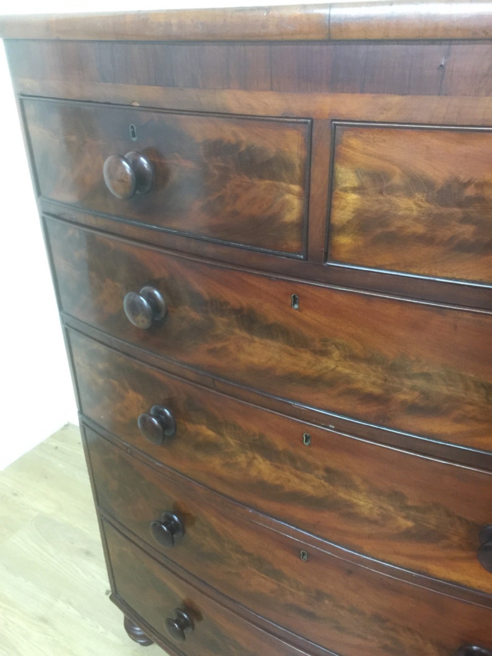 Nineteenth century flame mahogany five height bow fronted chest of drawers  View VIII