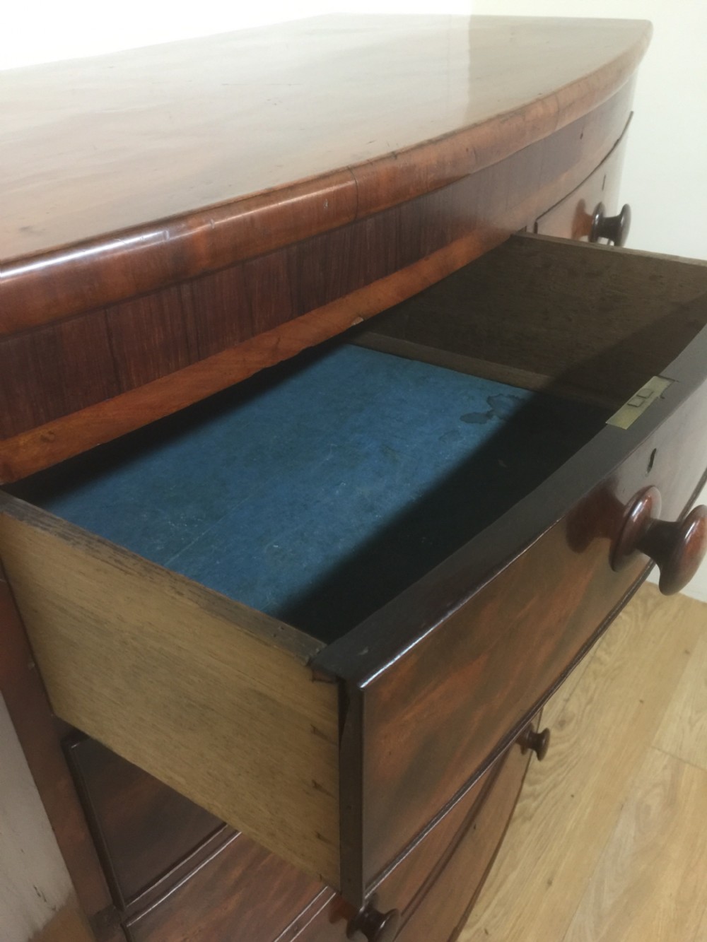 Nineteenth century flame mahogany five height bow fronted chest of drawers  View X
