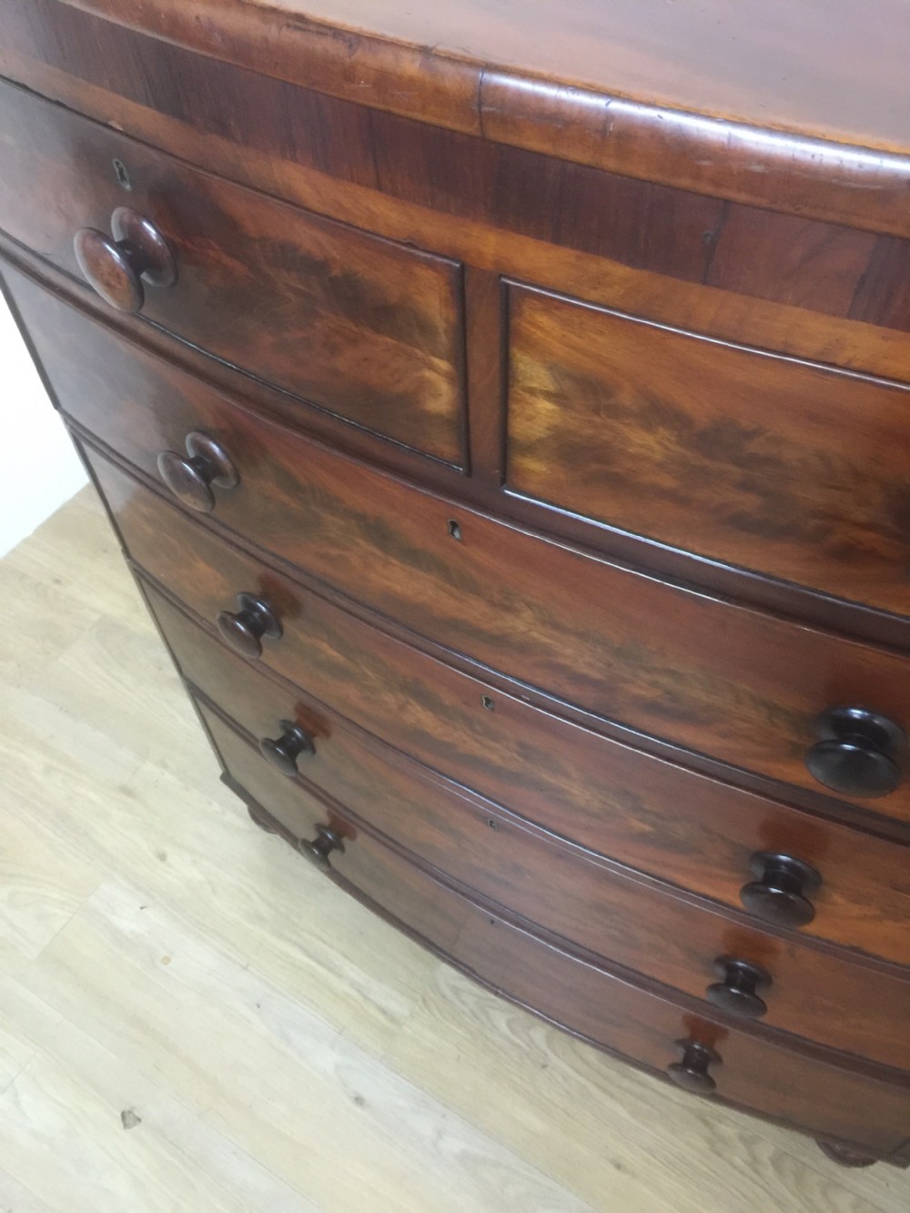 Nineteenth century flame mahogany five height bow fronted chest of drawers  View XII