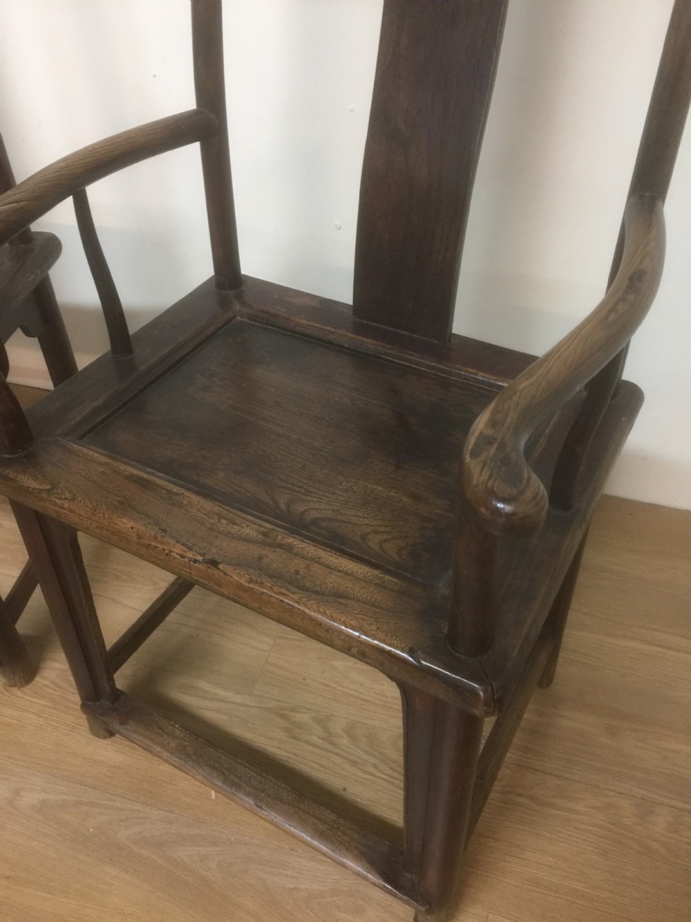 Pair Late nineteenth century Chinese elm yoke chairs  View III