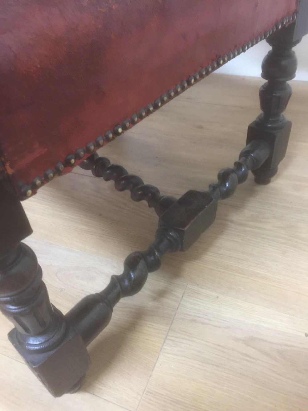 Pair of carved oak baronial chairs in original distressed leather View VIII