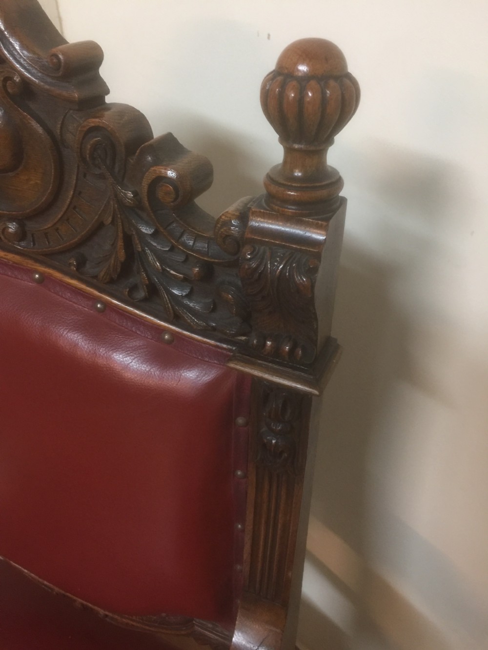 Victorian carved oak armchair in red leather View II