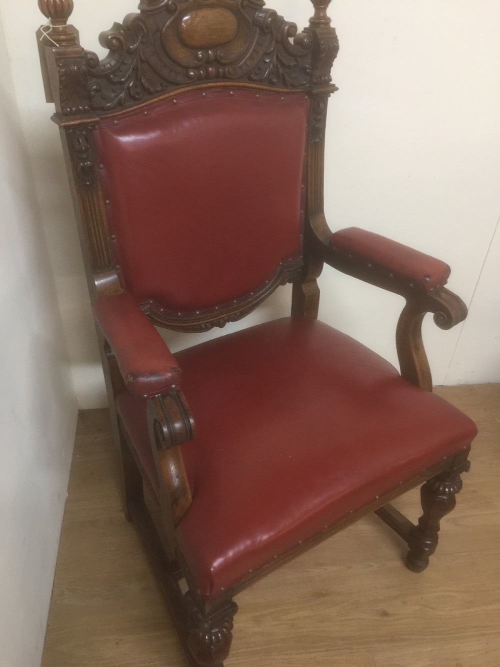 Victorian carved oak armchair in red leather View III