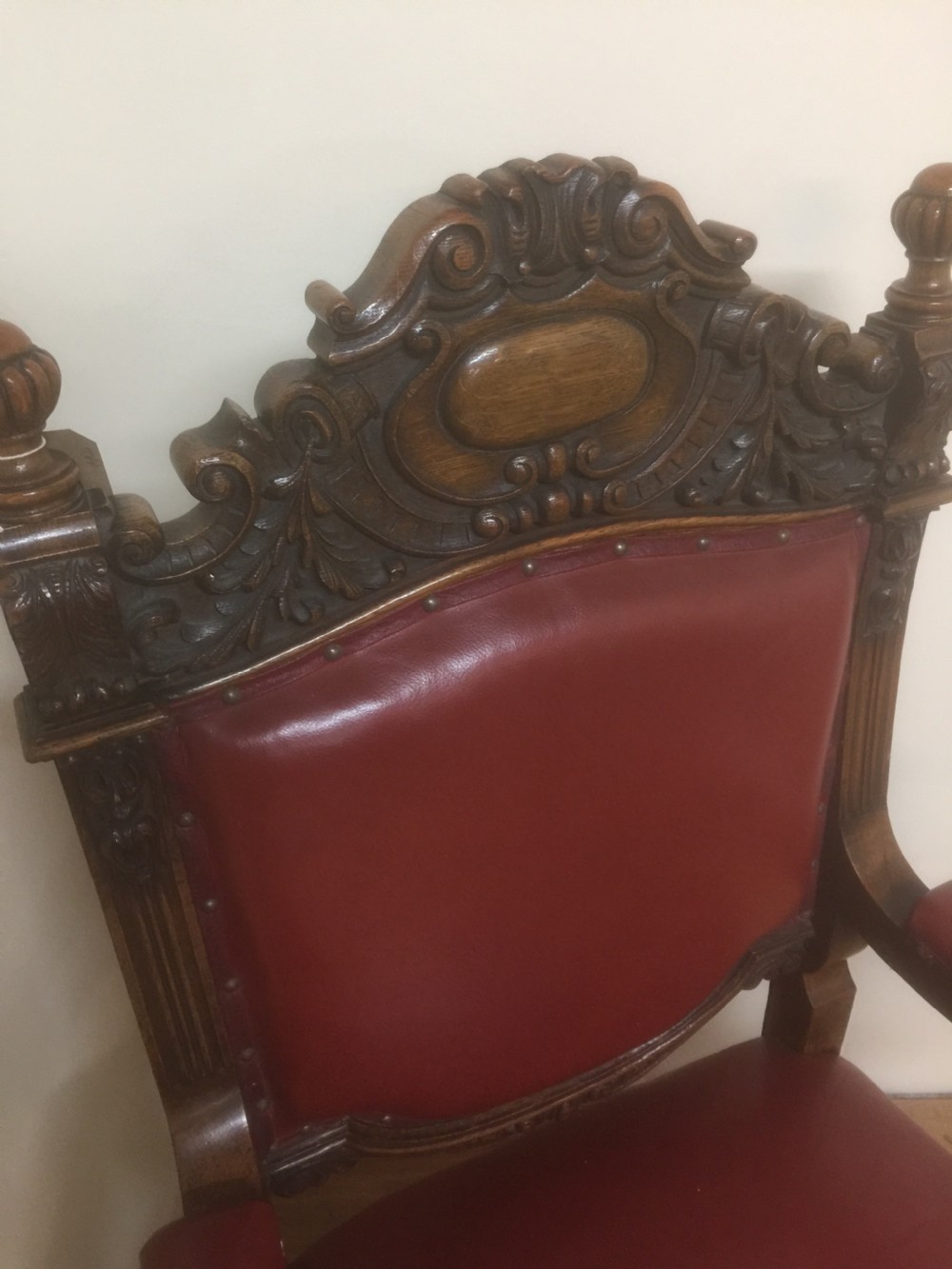 Victorian carved oak armchair in red leather View IV