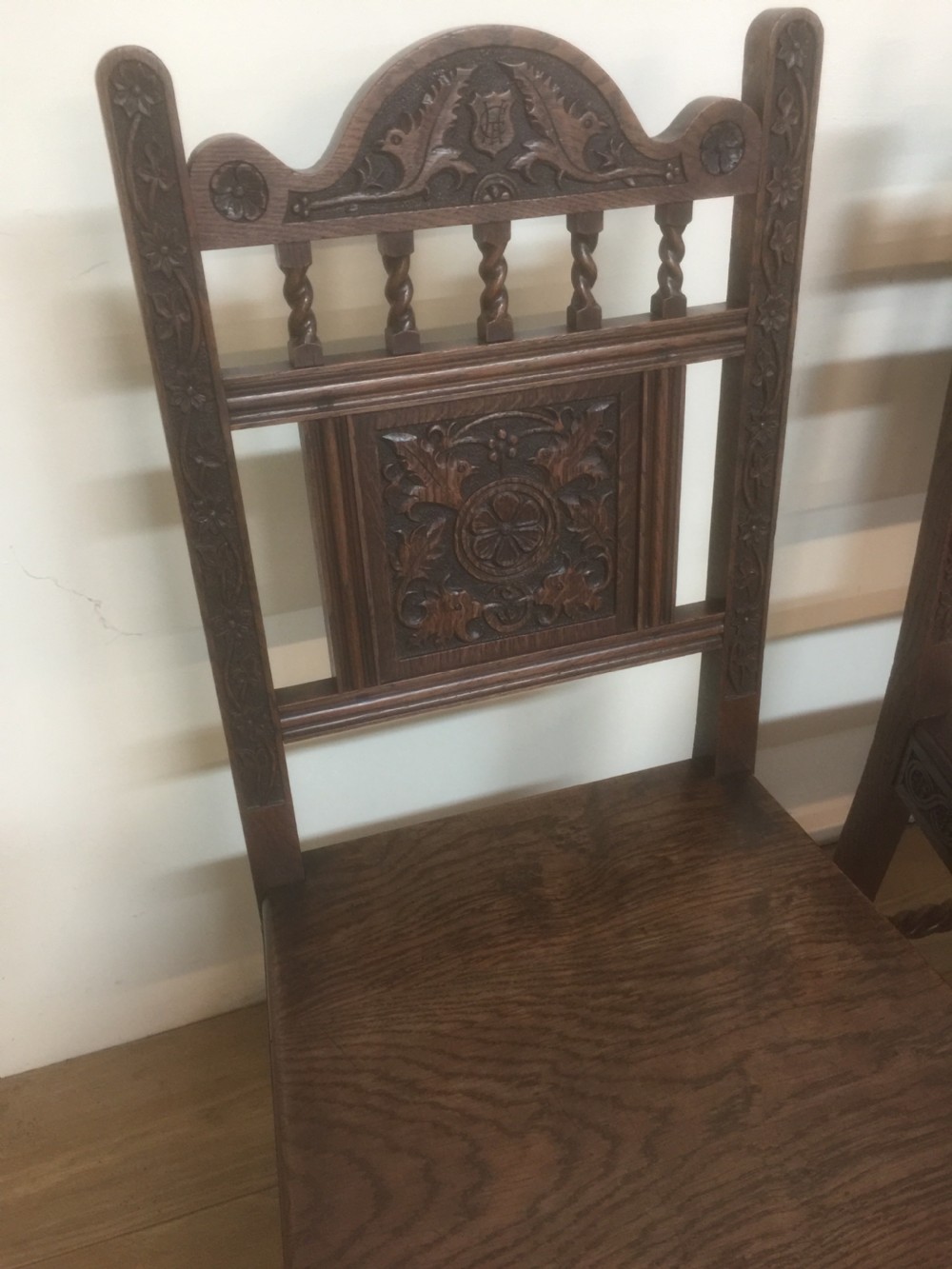 Four hand carved Edwardian oak chairs  View II