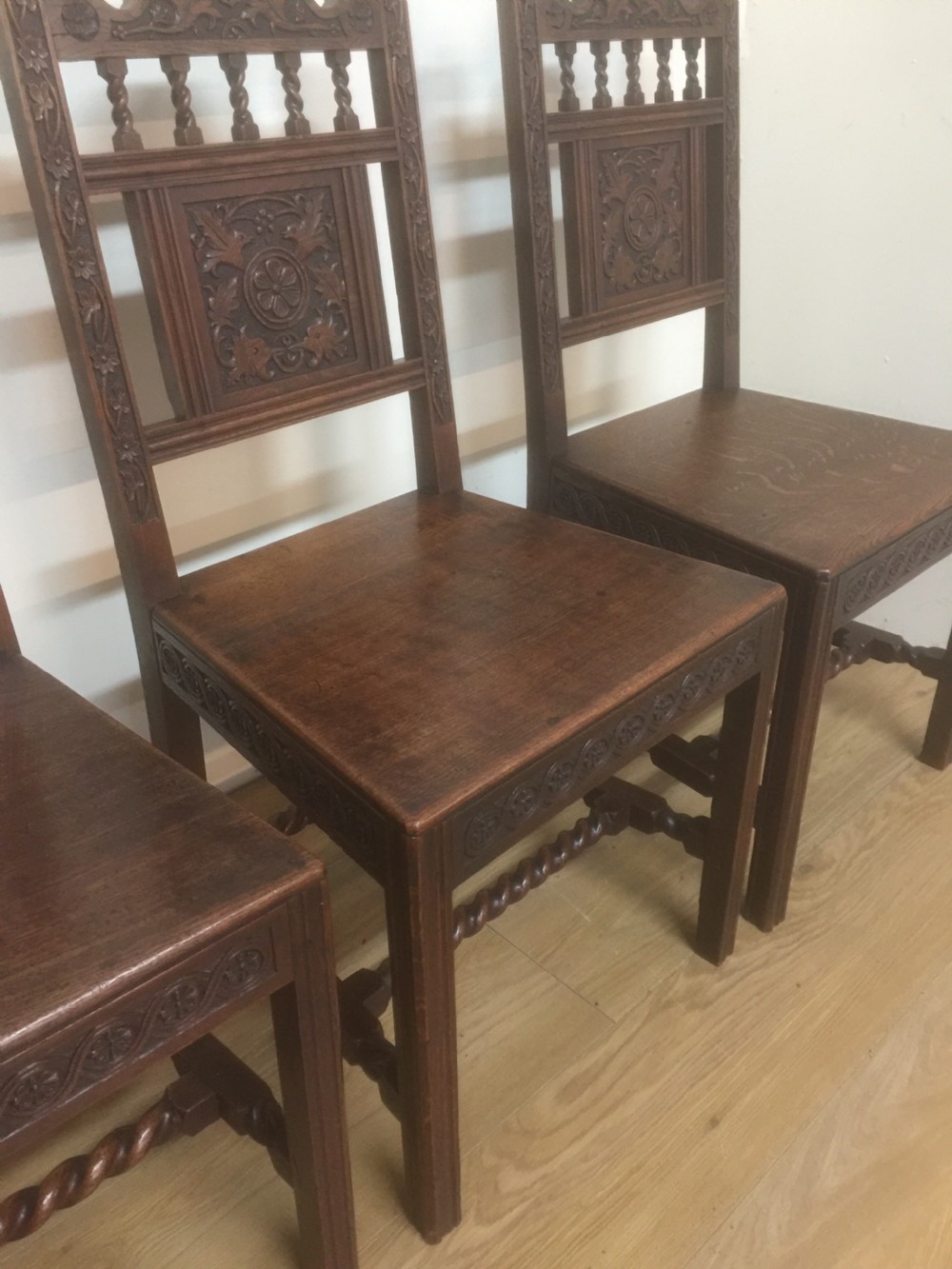 Four hand carved Edwardian oak chairs  View V