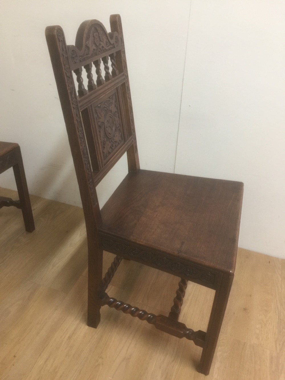Four hand carved Edwardian oak chairs  View VII