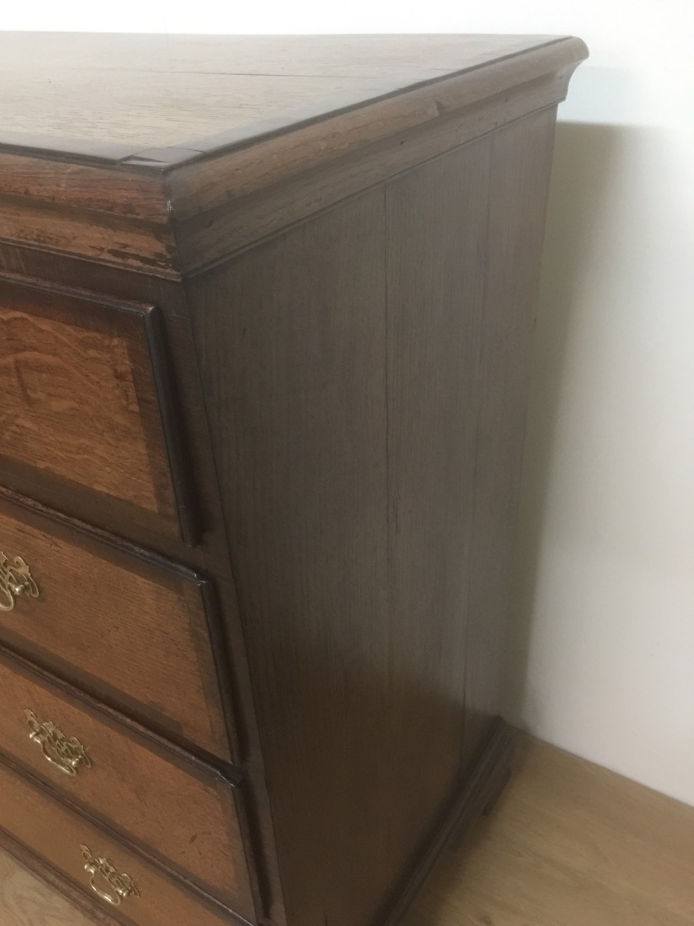 Georgian golden oak and crossbanded mahogany Chest Of Drawers.  View II