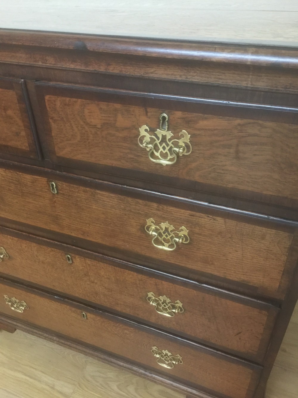 Georgian golden oak and crossbanded mahogany Chest Of Drawers.  View III