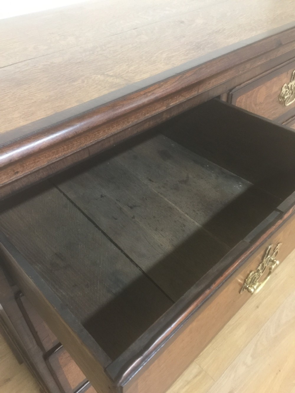 Georgian golden oak and crossbanded mahogany Chest Of Drawers.  View VI