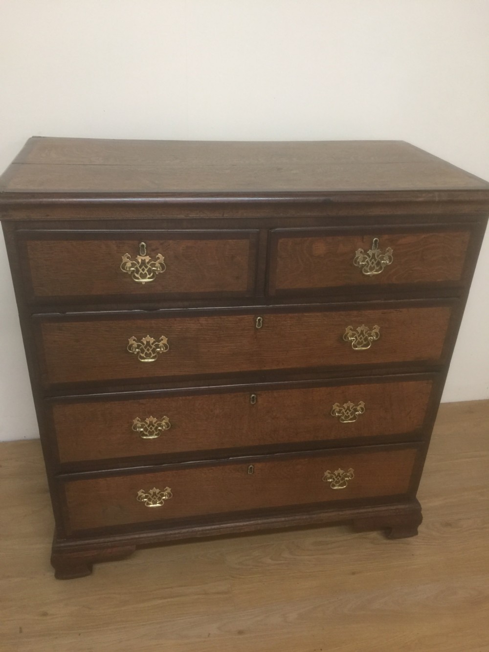 Georgian golden oak and crossbanded mahogany Chest Of Drawers.  View XI