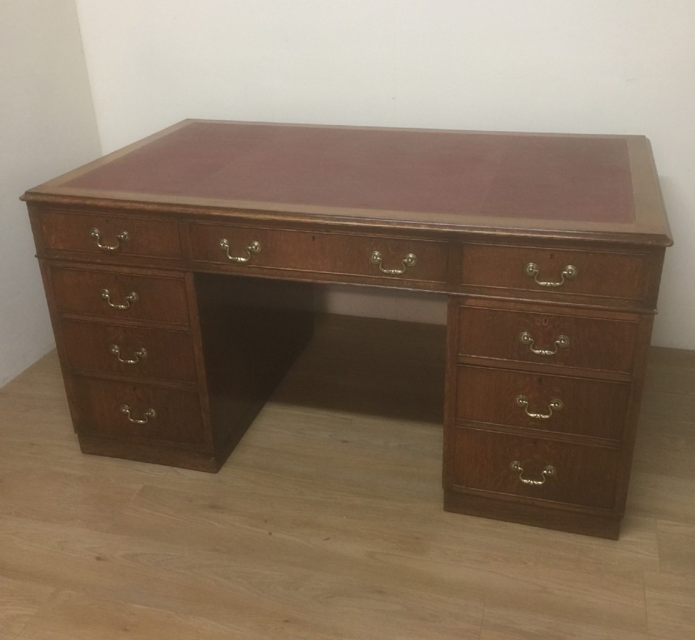 Oak twin Pedestal desk by Catesby London circa 1920
