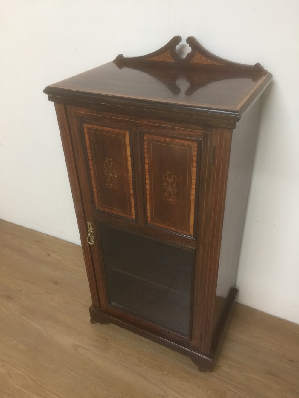 Nineteenth century inlaid mahogany glazed music cabinet 