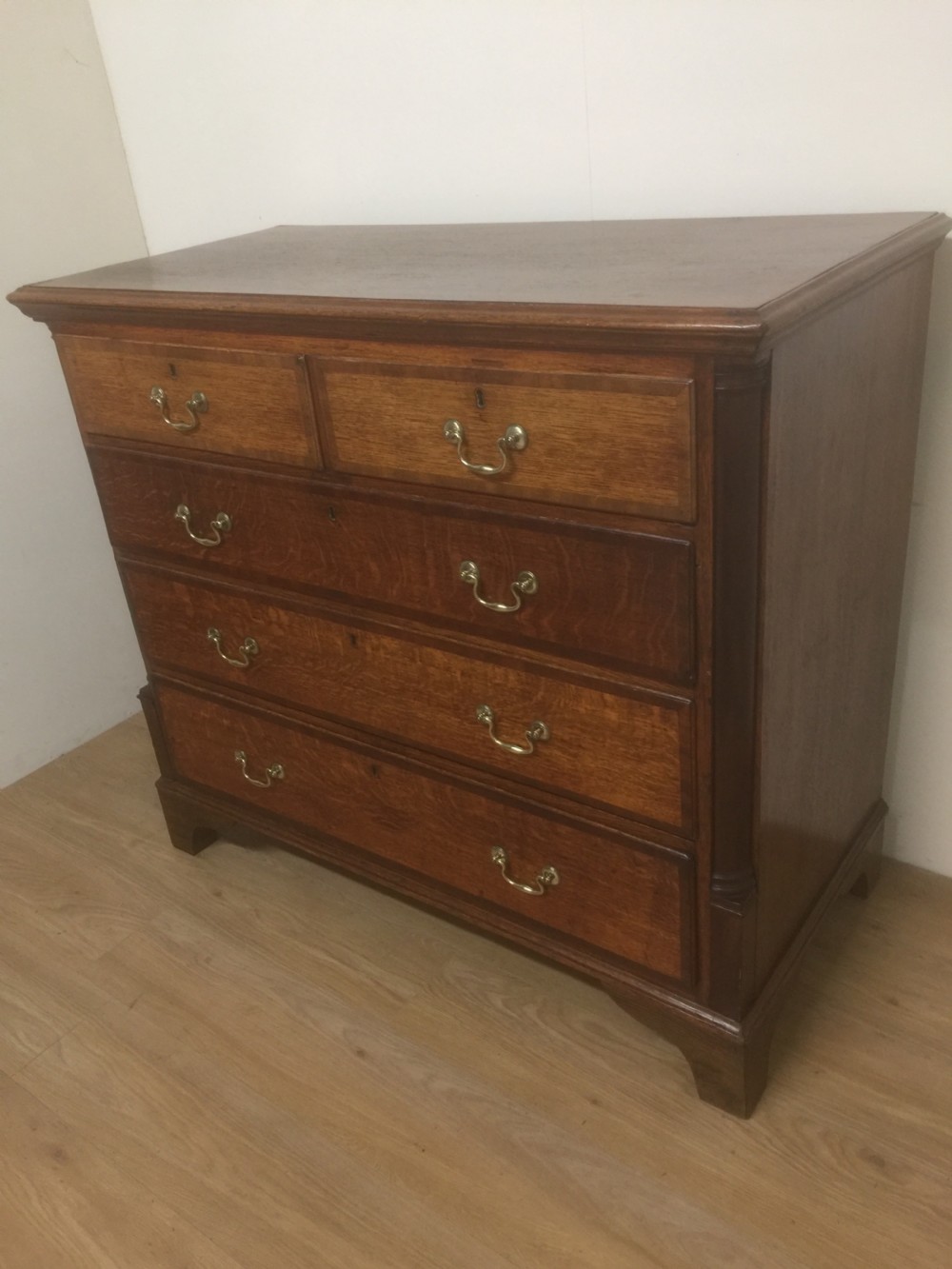 Georgian golden oak chest of drawers crossbanded in Mahogany  View II