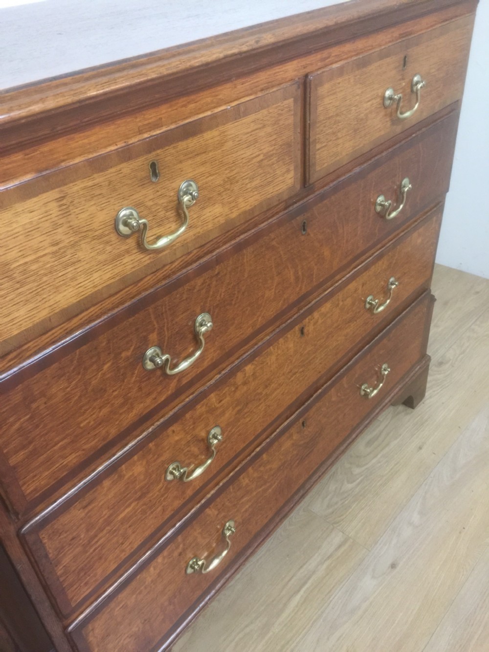 Georgian golden oak chest of drawers crossbanded in Mahogany  View V
