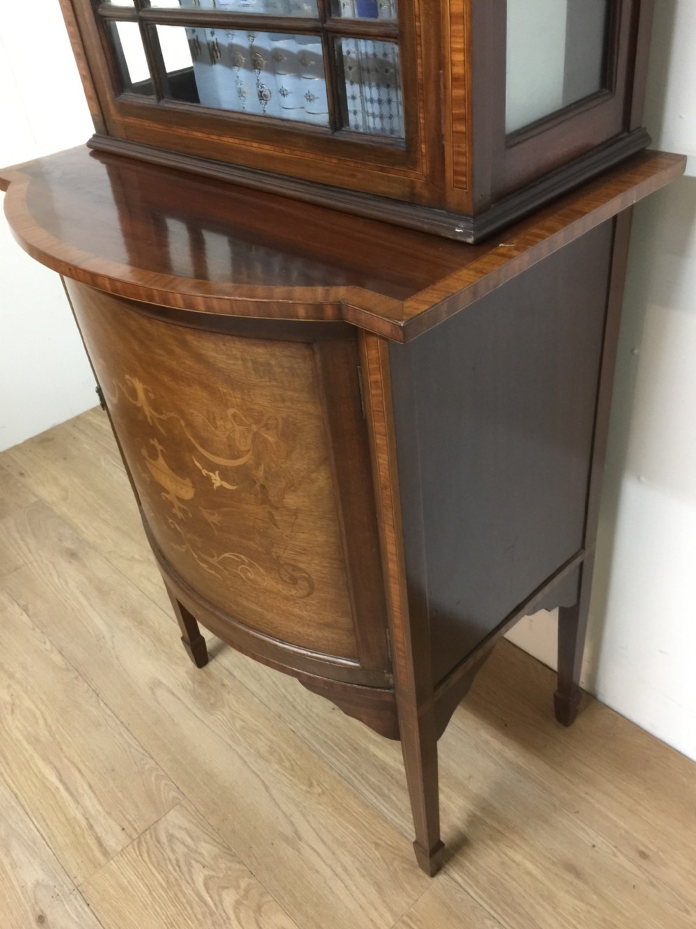Edwardian Inlaid mahogany cabinet over cupboard on tapered feet  View VI