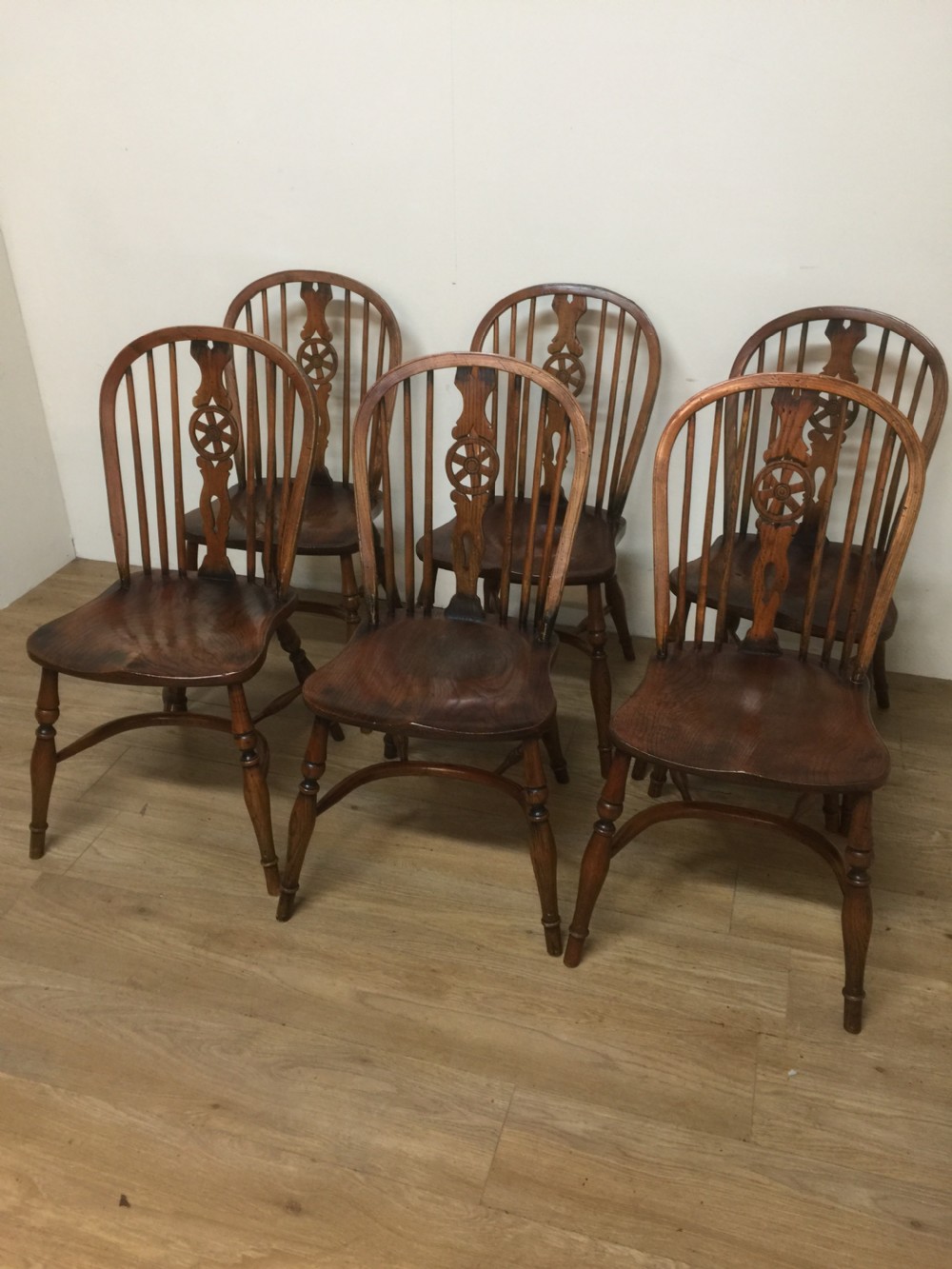 Six elm country chairs with crinoline under stretchers   