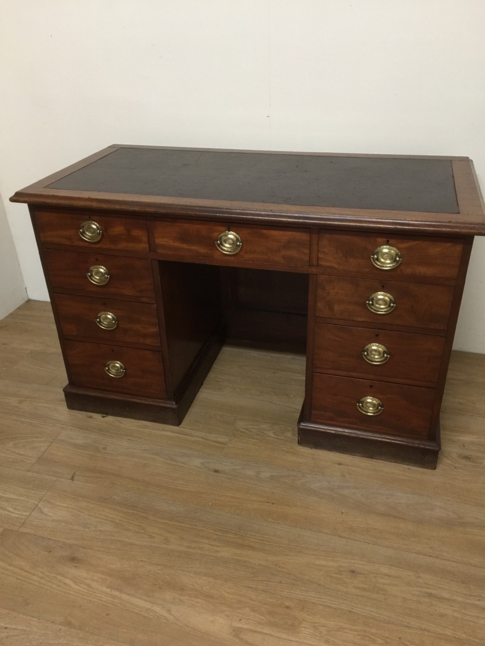 Nineteenth century mahogany twin Pedestal desk with brass oval plate handles
