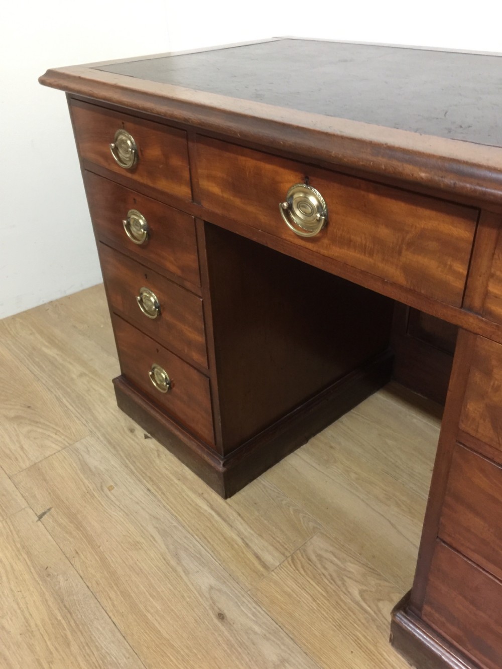 Nineteenth century mahogany twin Pedestal desk with brass oval plate handles View V