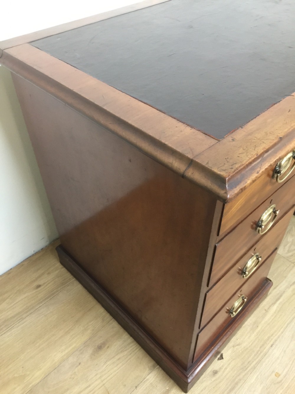 Nineteenth century mahogany twin Pedestal desk with brass oval plate handles View VII