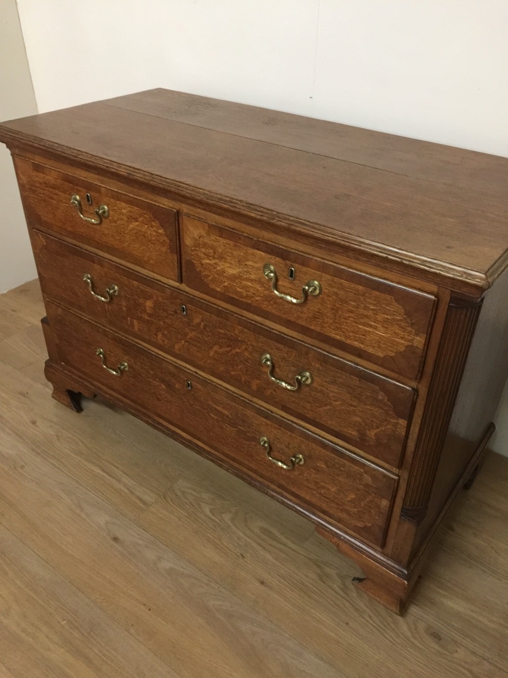 Georgian golden oak crossbanded Chest Of Drawers  View II