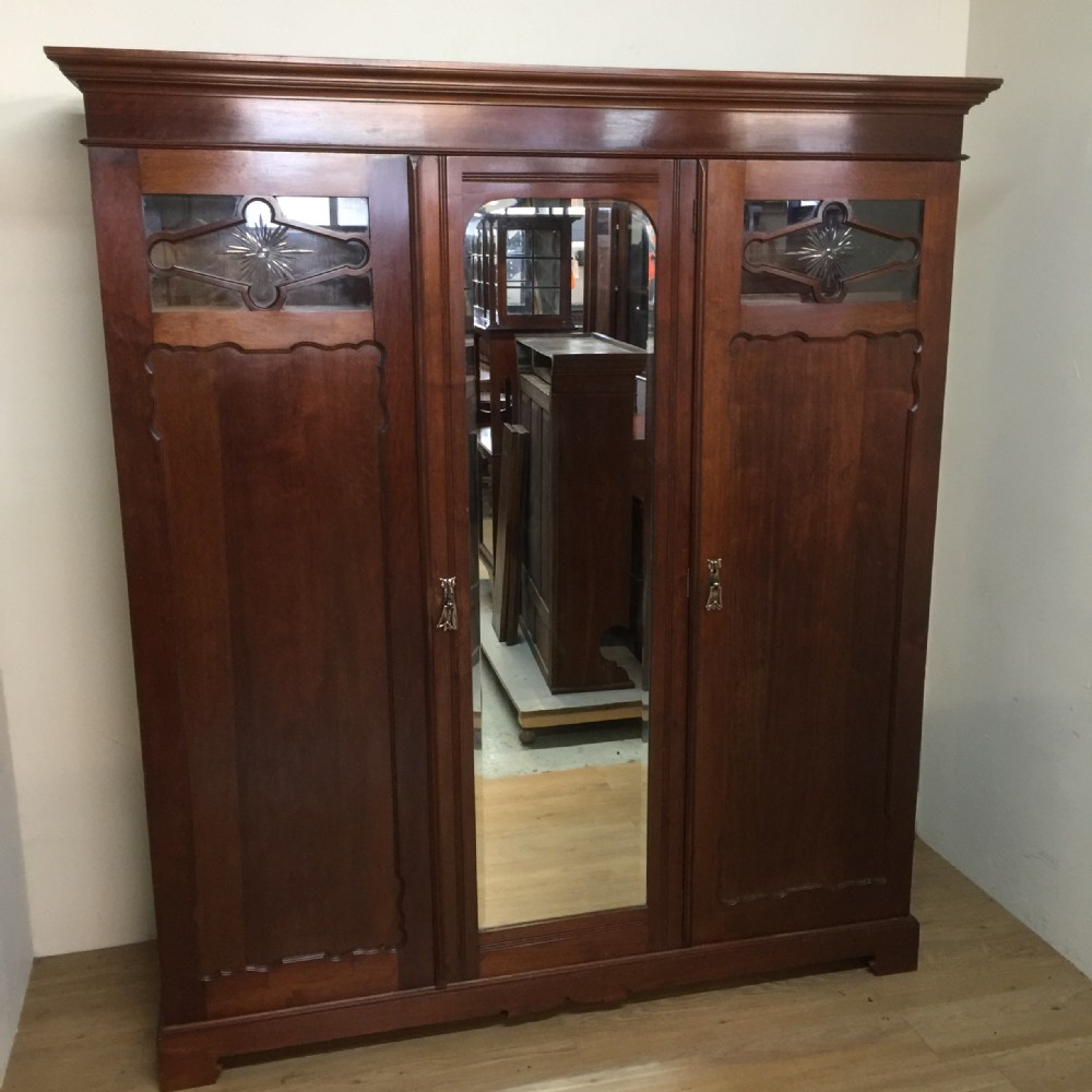 Nineteenth century walnut three door wardrobe 