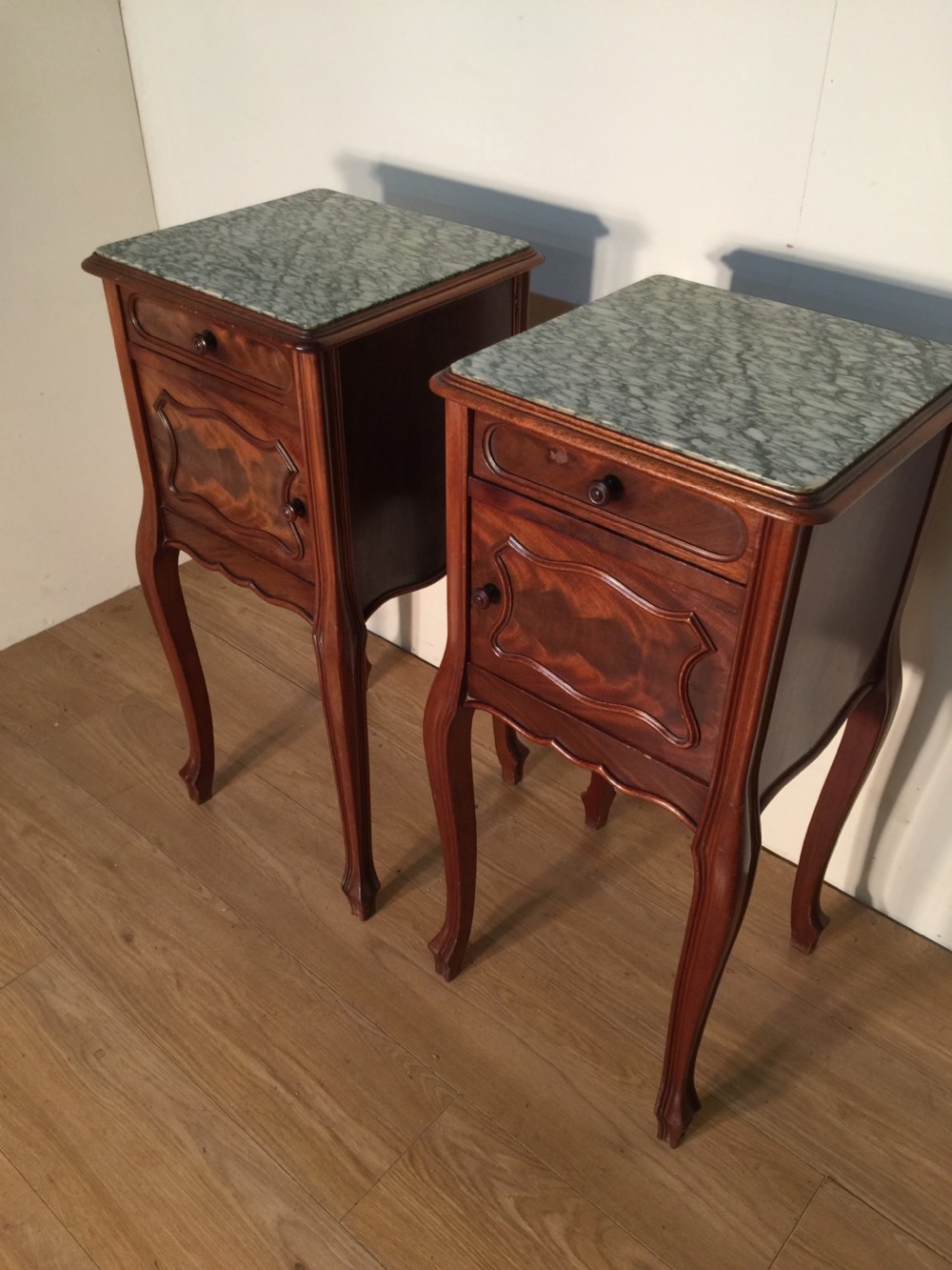 Pair of French walnut marble topped bedside cabinets circa 1920