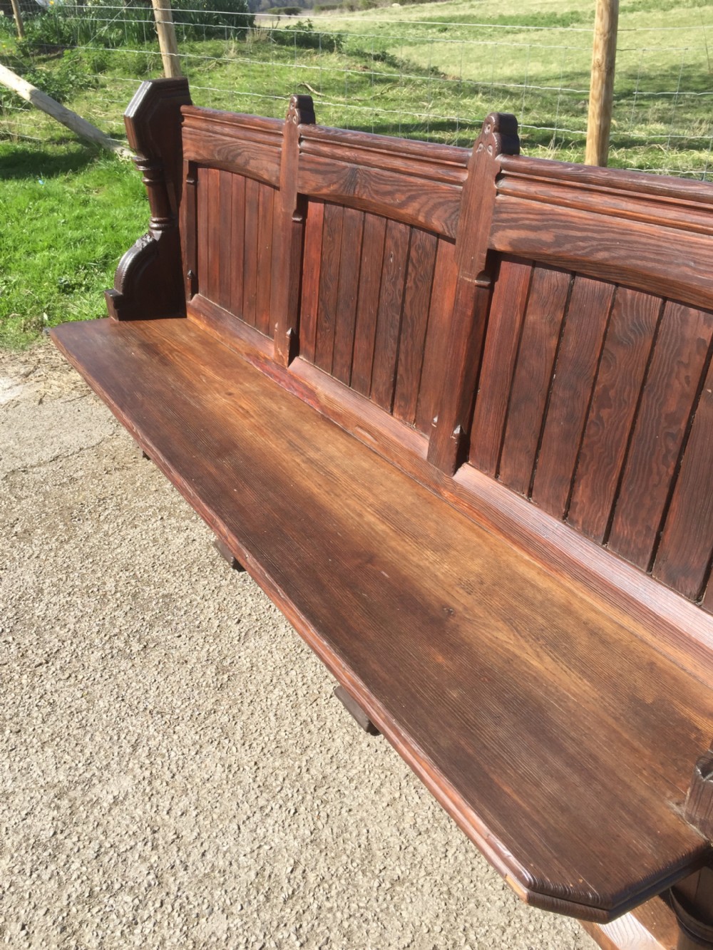 Nineteenth century carved pitch pine pew with panelled back  View II