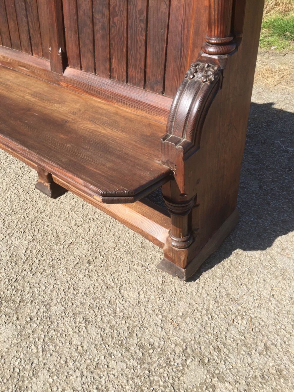 Nineteenth century carved pitch pine pew with panelled back  View III