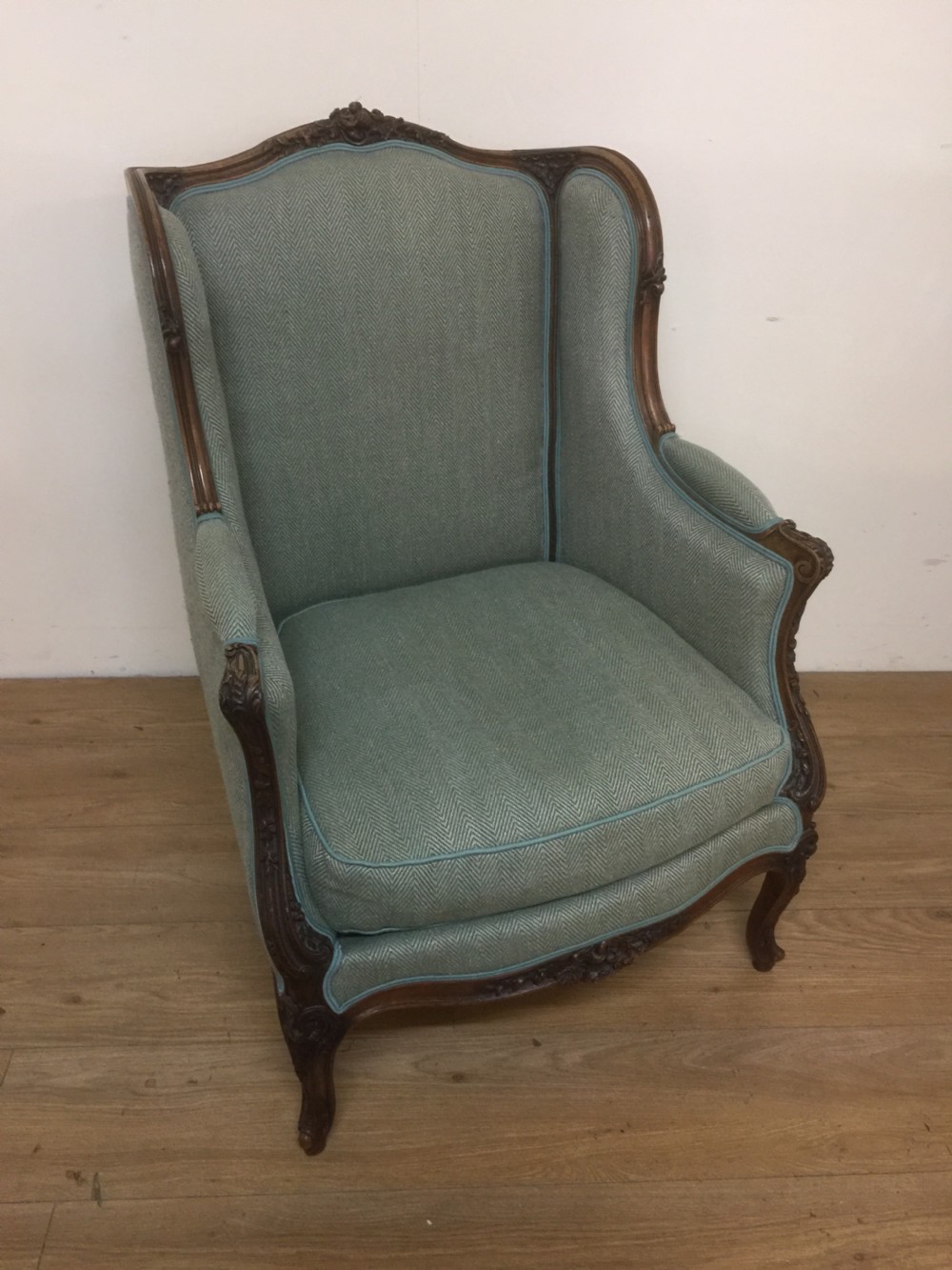 Nineteenth century French carved walnut winged armchair  View IX