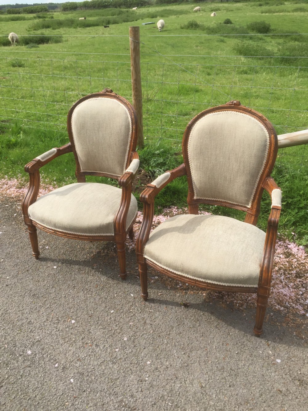 Pair of carved oak French armchairs circa 1920