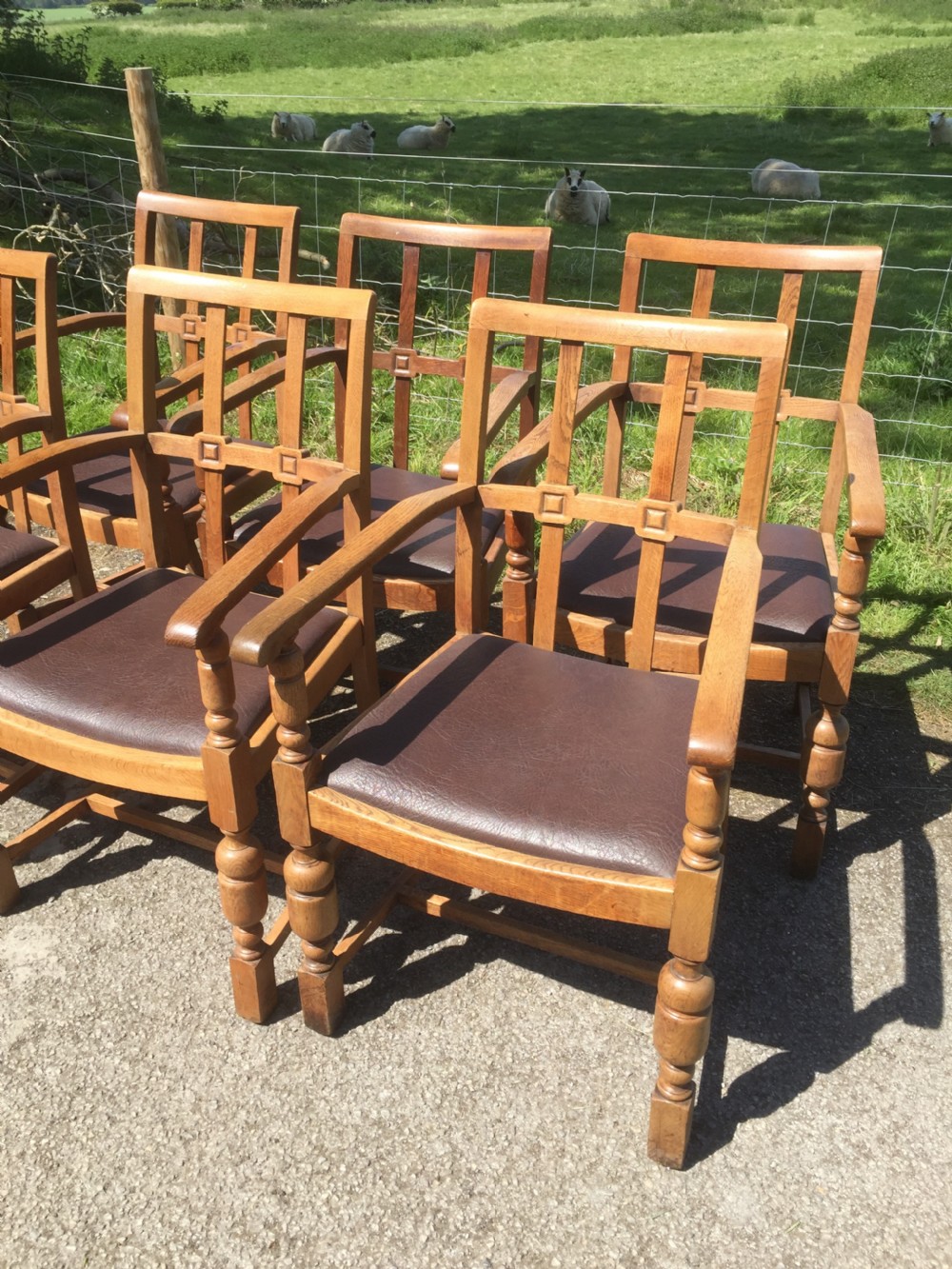 Six golden oak Arts and Crafts armchairs  View II