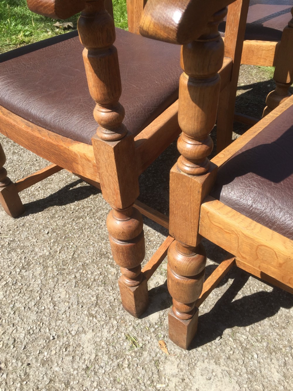 Six golden oak Arts and Crafts armchairs  View V