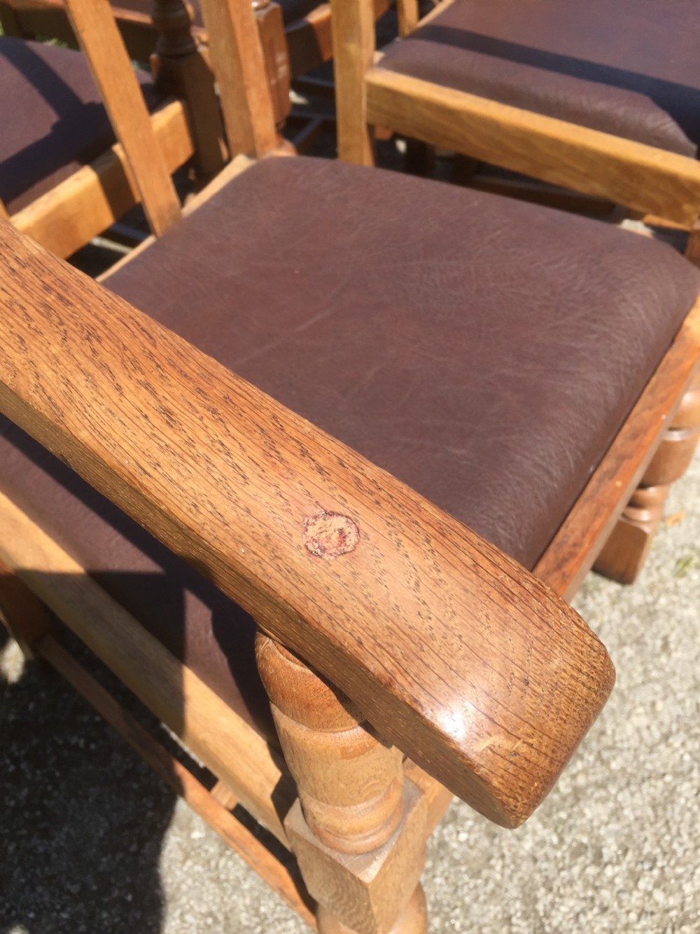 Six golden oak Arts and Crafts armchairs  View VI